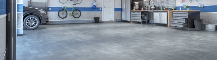 new garage floor with tool box and bikes on the wall